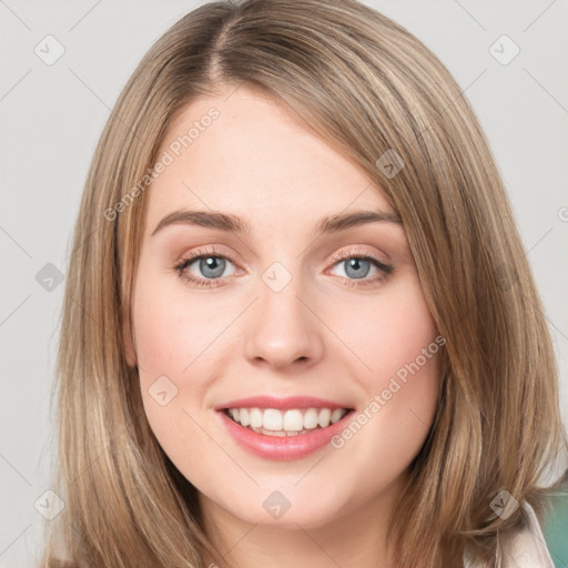 Joyful white young-adult female with medium  brown hair and green eyes