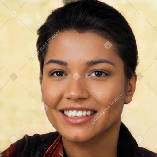 Joyful latino young-adult female with long  black hair and brown eyes