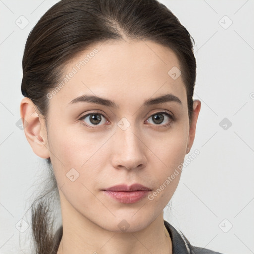 Neutral white young-adult female with medium  brown hair and brown eyes