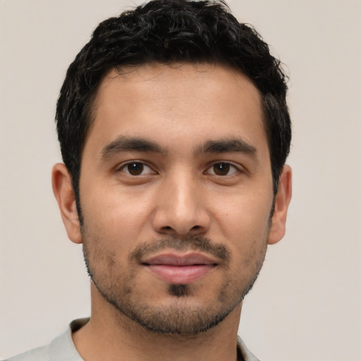 Neutral white young-adult male with short  black hair and brown eyes