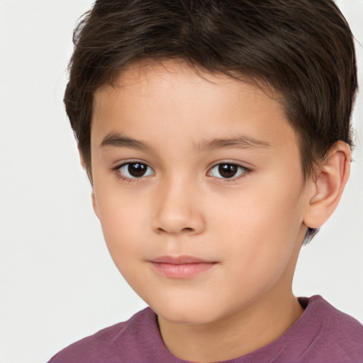 Joyful white child male with short  brown hair and brown eyes