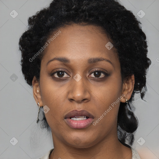 Neutral black young-adult female with short  black hair and brown eyes