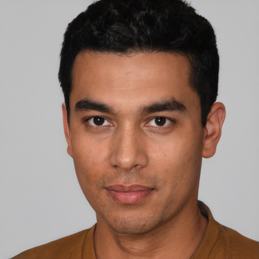 Neutral latino young-adult male with short  black hair and brown eyes