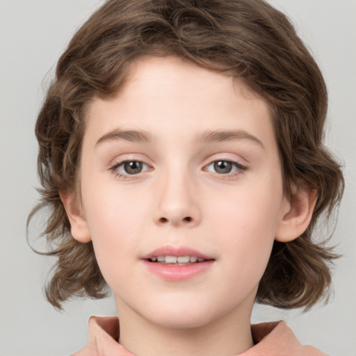 Joyful white child female with medium  brown hair and brown eyes