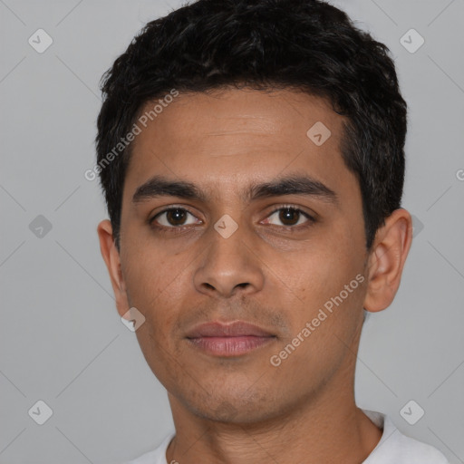 Neutral latino young-adult male with short  black hair and brown eyes