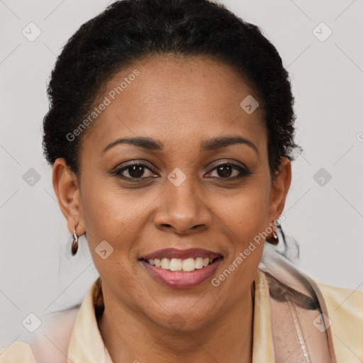 Joyful latino adult female with short  brown hair and brown eyes