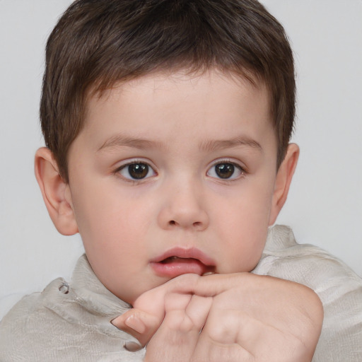 Neutral white child male with short  brown hair and brown eyes