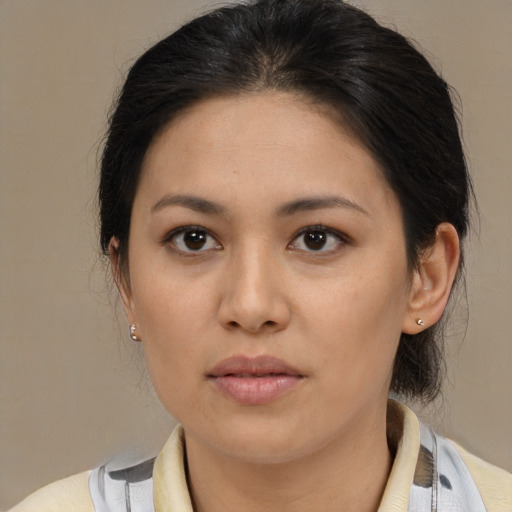 Neutral latino young-adult female with medium  brown hair and brown eyes
