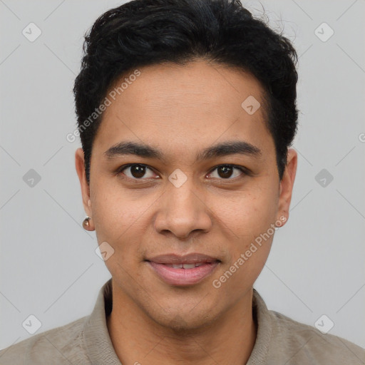 Joyful latino young-adult male with short  brown hair and brown eyes