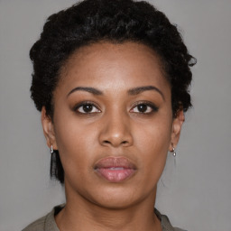 Neutral black young-adult female with short  black hair and brown eyes