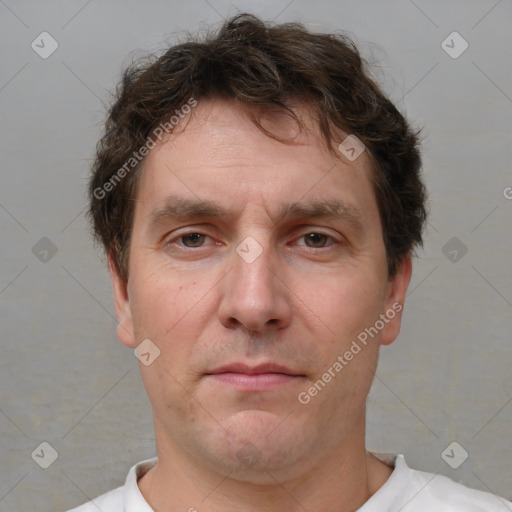 Neutral white adult male with short  brown hair and brown eyes