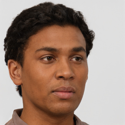 Neutral latino young-adult male with short  brown hair and brown eyes