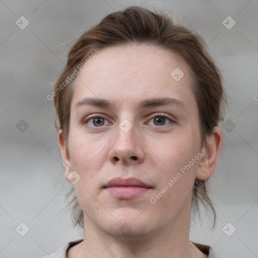 Neutral white young-adult female with medium  brown hair and grey eyes