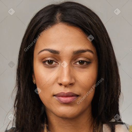 Joyful latino young-adult female with medium  brown hair and brown eyes