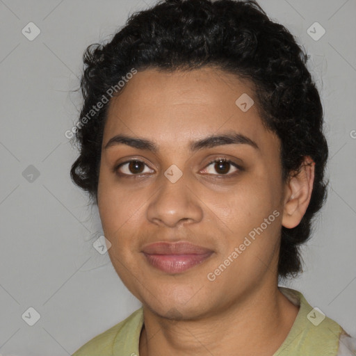 Joyful black young-adult female with medium  black hair and brown eyes