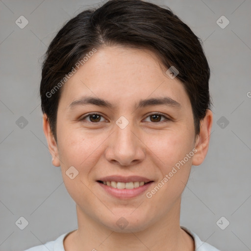 Joyful white young-adult female with short  brown hair and brown eyes