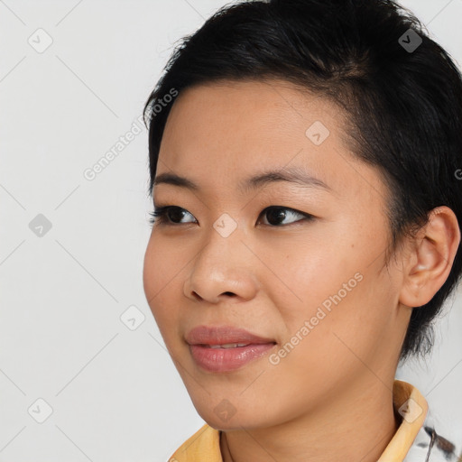 Joyful asian young-adult female with medium  black hair and brown eyes