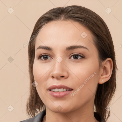 Joyful white young-adult female with medium  brown hair and brown eyes