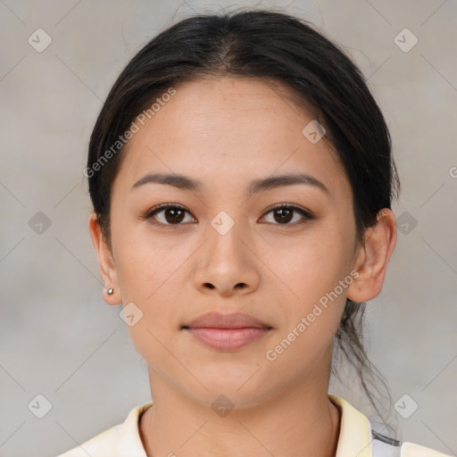 Joyful asian young-adult female with short  brown hair and brown eyes