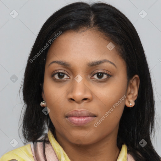 Joyful latino young-adult female with long  brown hair and brown eyes