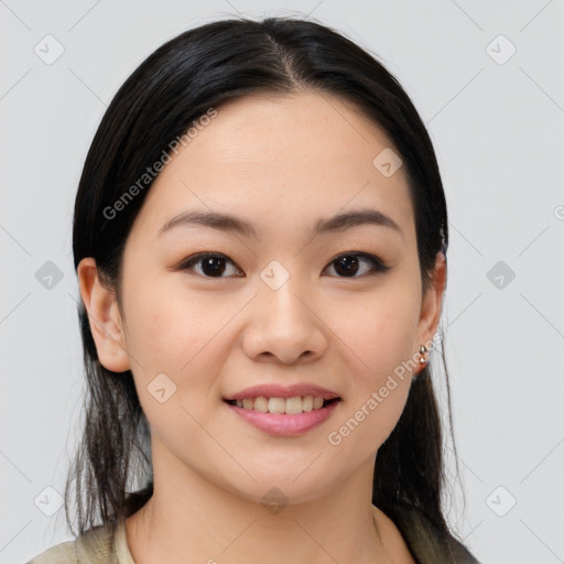 Joyful asian young-adult female with medium  black hair and brown eyes