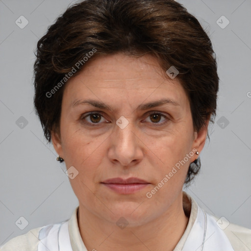 Joyful white adult female with medium  brown hair and brown eyes