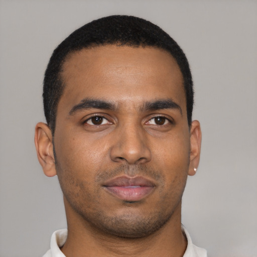 Neutral black young-adult male with short  brown hair and brown eyes
