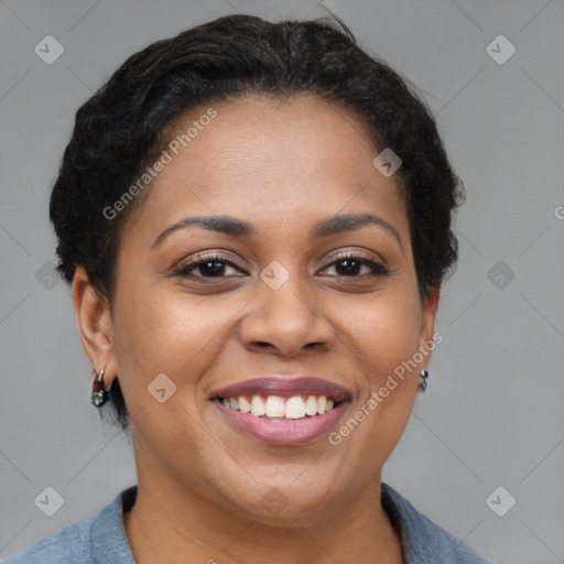 Joyful black young-adult female with short  brown hair and brown eyes