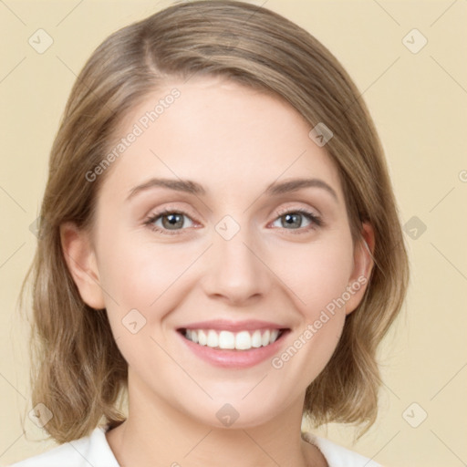 Joyful white young-adult female with medium  brown hair and green eyes