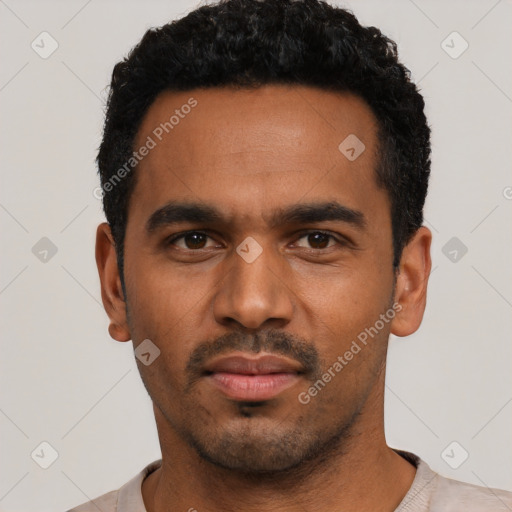 Neutral black young-adult male with short  black hair and brown eyes