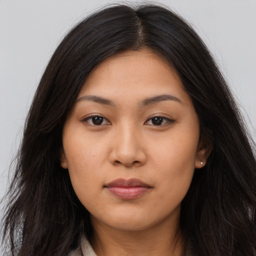 Neutral asian young-adult female with long  brown hair and brown eyes