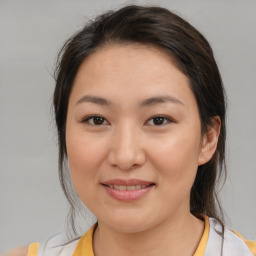 Joyful white young-adult female with medium  brown hair and brown eyes