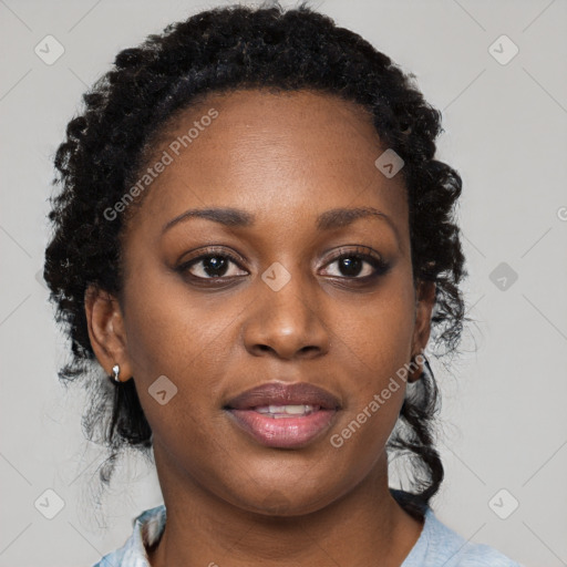 Joyful black young-adult female with medium  black hair and brown eyes