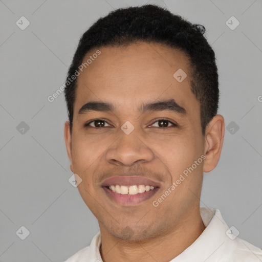 Joyful latino young-adult male with short  black hair and brown eyes