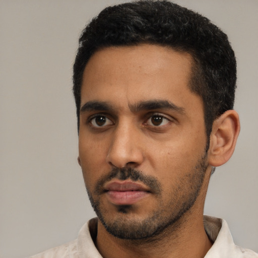 Neutral black young-adult male with short  black hair and brown eyes
