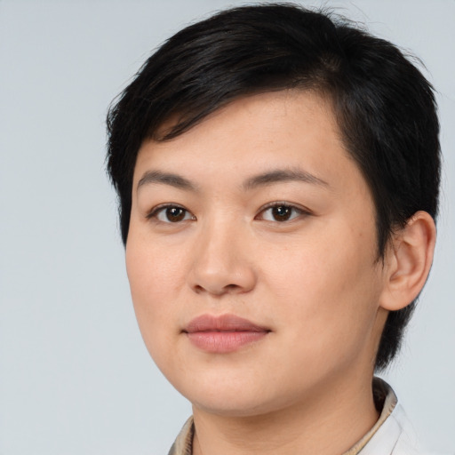 Joyful white young-adult female with medium  black hair and brown eyes