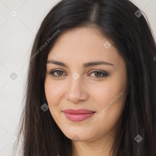 Joyful latino young-adult female with long  brown hair and brown eyes