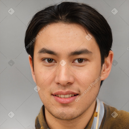 Joyful latino young-adult male with short  brown hair and brown eyes