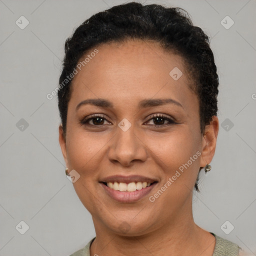 Joyful latino young-adult female with short  brown hair and brown eyes