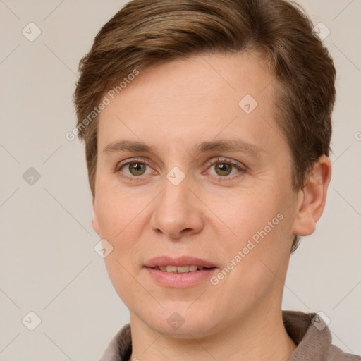 Joyful white young-adult female with short  brown hair and grey eyes