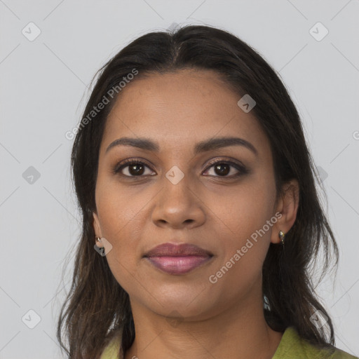 Joyful black young-adult female with medium  brown hair and brown eyes