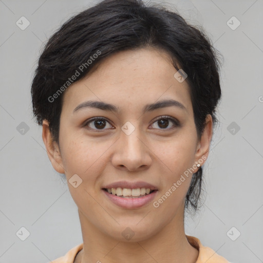 Joyful latino young-adult female with short  brown hair and brown eyes