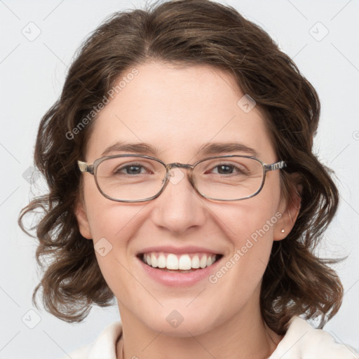 Joyful white young-adult female with medium  brown hair and blue eyes