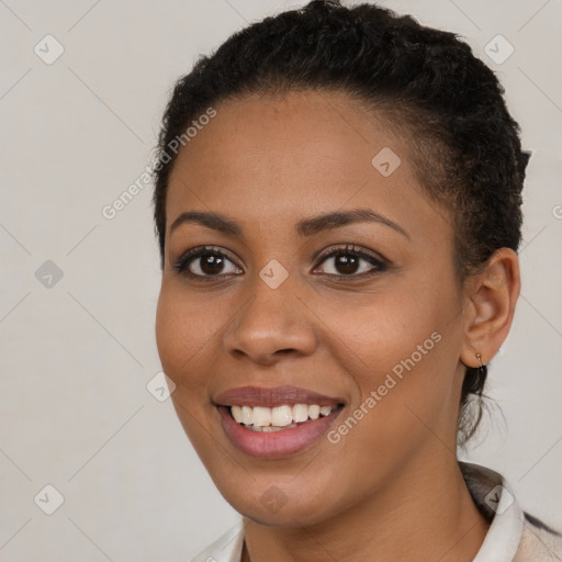 Joyful latino young-adult female with short  brown hair and brown eyes