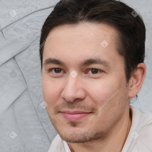 Joyful white young-adult male with short  brown hair and brown eyes