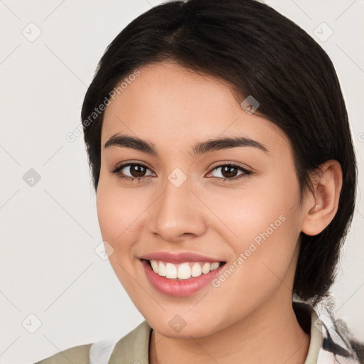 Joyful white young-adult female with medium  brown hair and brown eyes