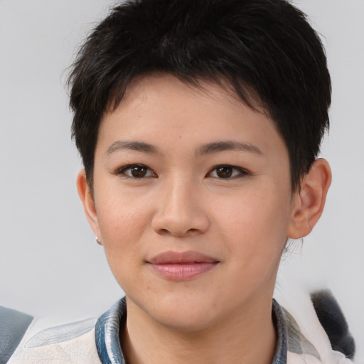 Joyful asian young-adult female with short  brown hair and brown eyes