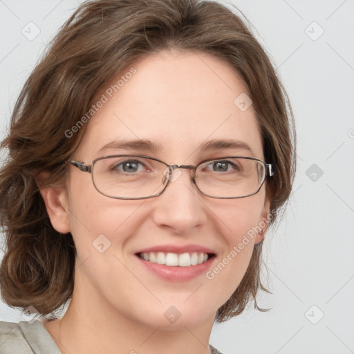 Joyful white young-adult female with medium  brown hair and blue eyes