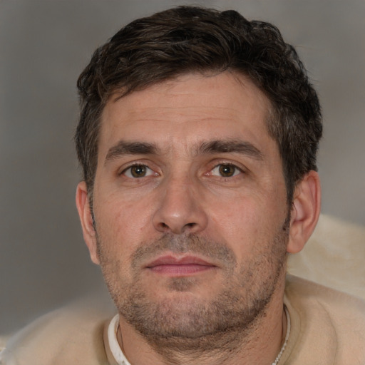 Neutral white adult male with short  brown hair and brown eyes