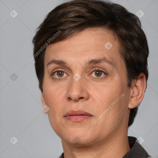 Neutral white adult female with short  brown hair and grey eyes